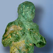 A bronze statuette of Cupid, the Roman god of love, found in a house in the civil settlement at Caerleon.